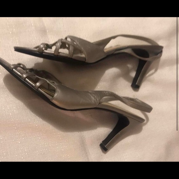 Silver open toe strapped heels. Size 9.5 medium
Lightly used - Like new - Picture 4 of 4